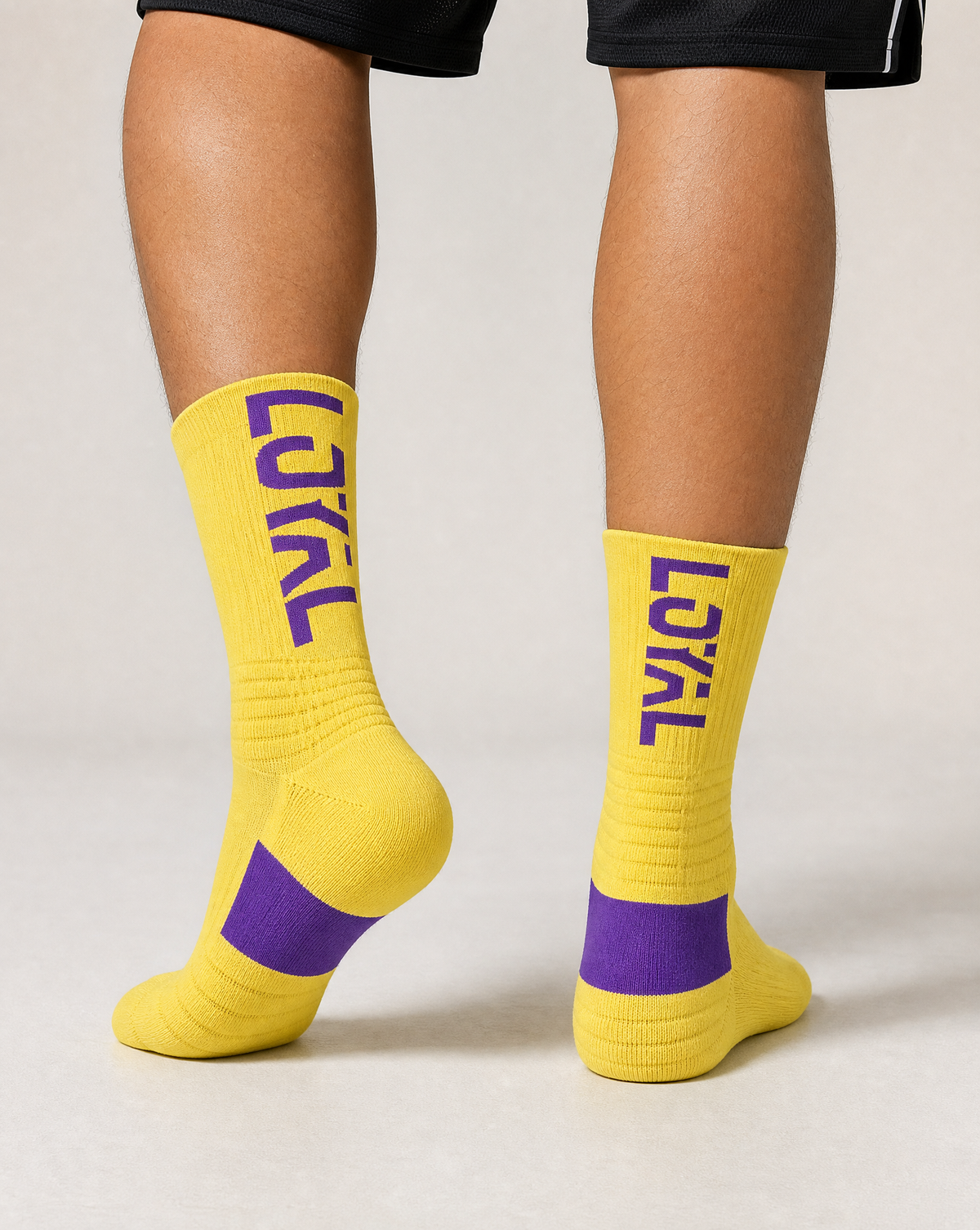 Yellow and Purple Crew Socks worn, studio